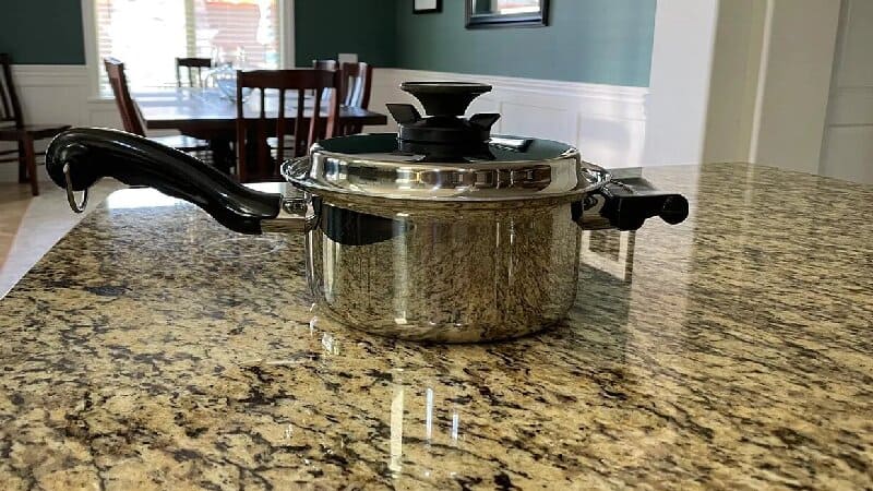 Granite kitchen countertop with cooking utensils